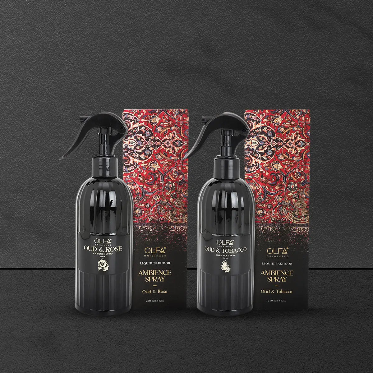 Oud ambience spray duo featuring Oud & Rose and Oud & Tobacco fragrances