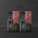 Oud ambience spray duo featuring Oud & Rose and Oud & Tobacco fragrances