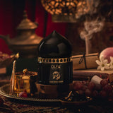 Olfa Oud Bakhoor fragrance jar with burning bakhoor in the background
