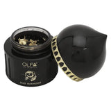 Open Oud Bakhoor jar showing fragrant bakhoor chips with decorative lid