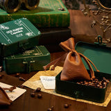 Pure Oud Parfum Pods with leather pouch in an open storage case